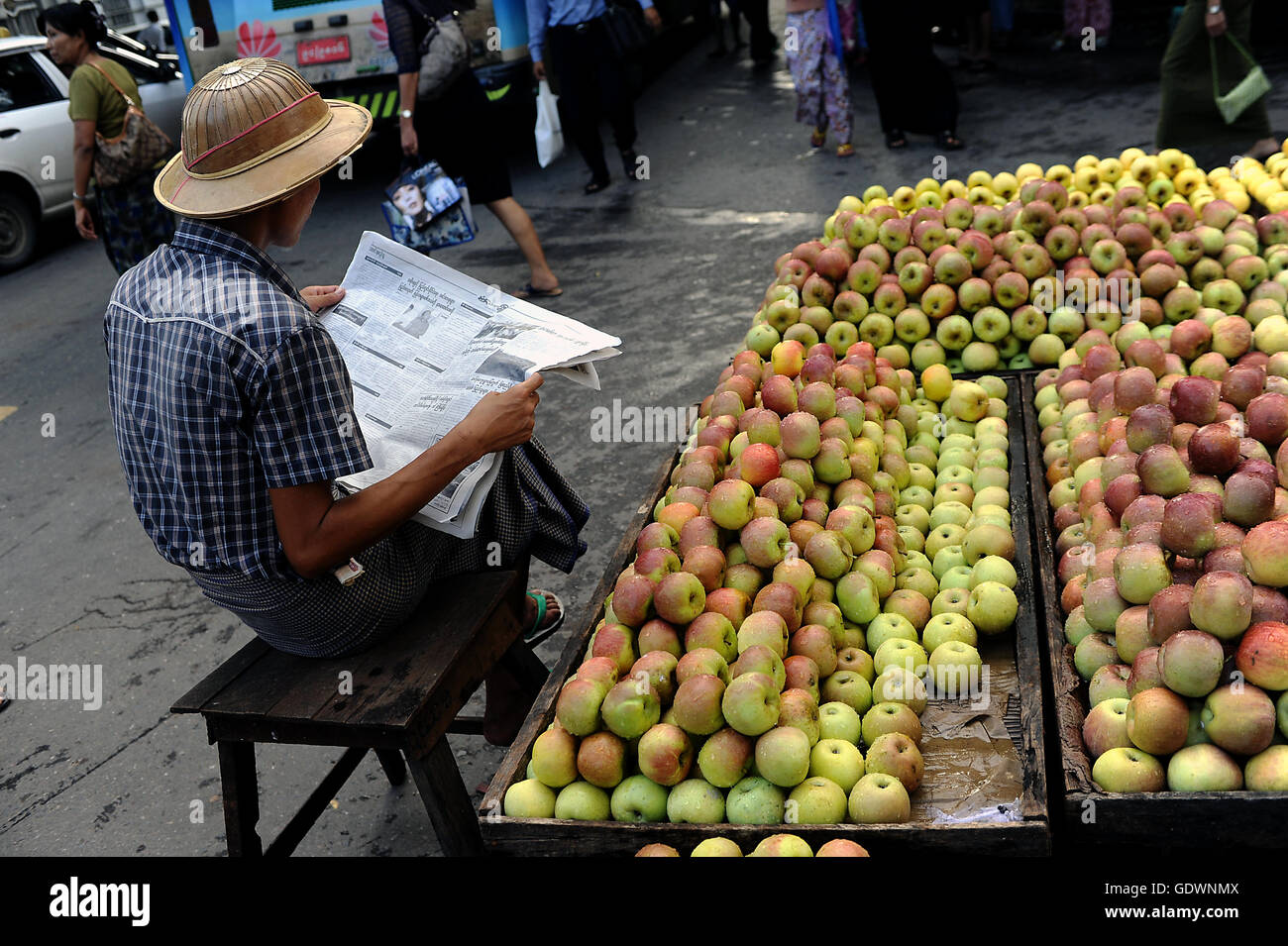 Apple seller in Yangon Stock Photo