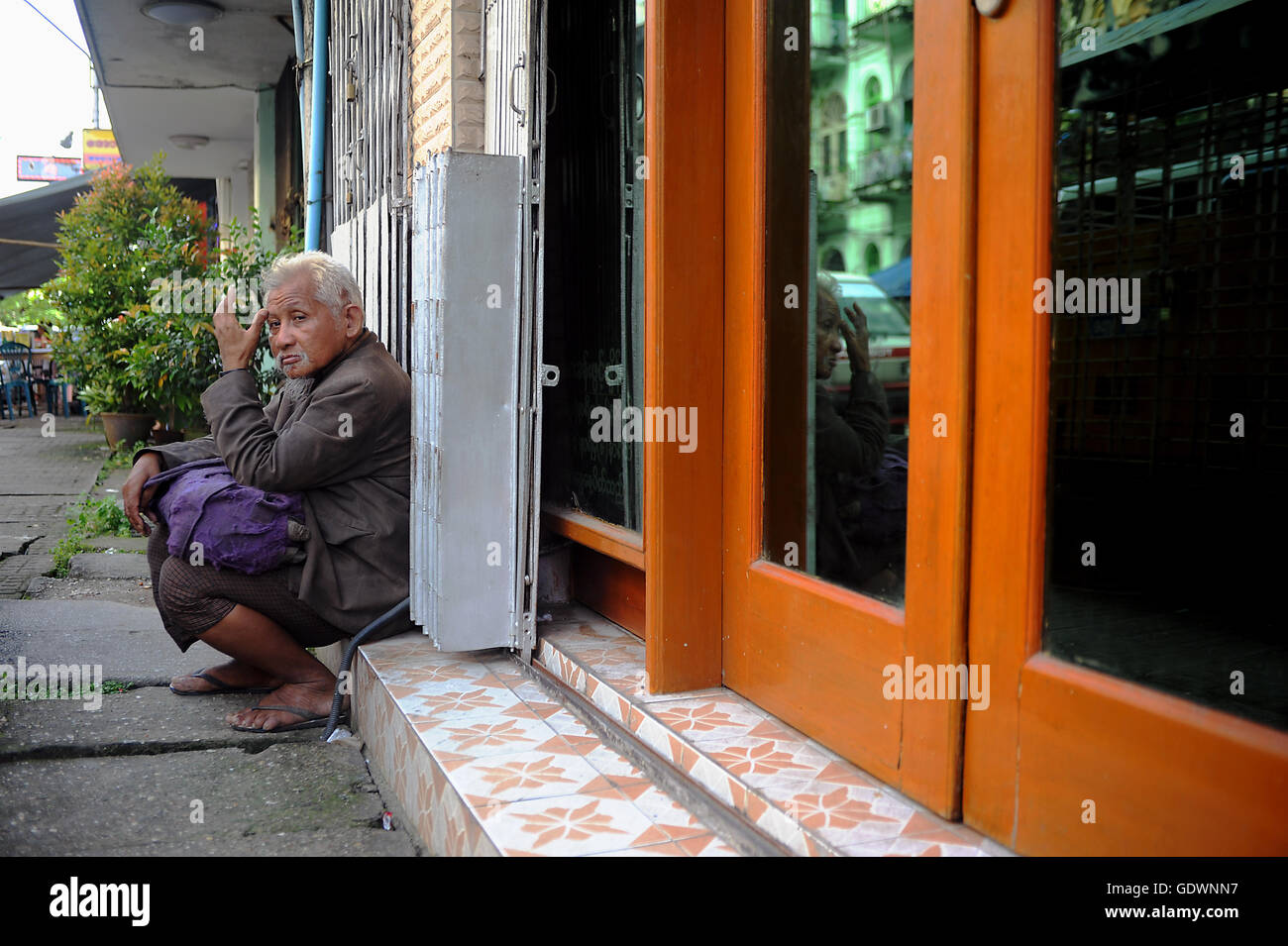 Homeless man in Yangon Stock Photo