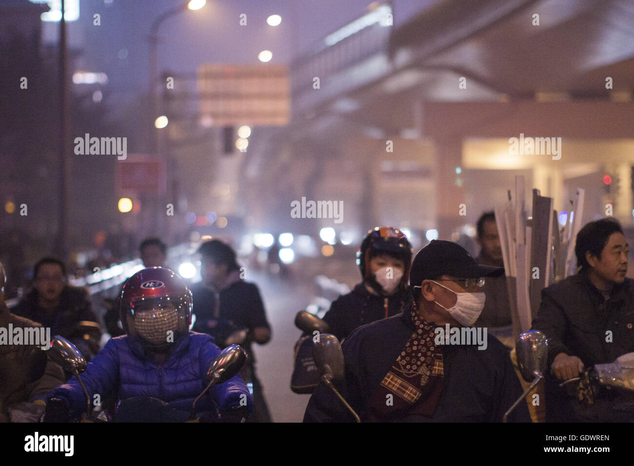 Drivers wear surgical masks on a street Stock Photo Alamy