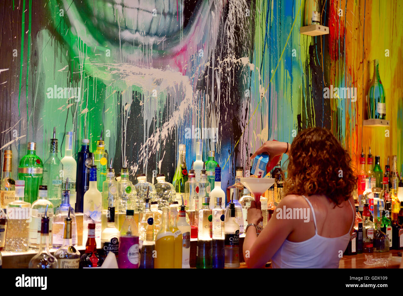 Bar, Steinbeck & Shaw, Bristol, decorated in very colourful way preparing drinks , UK Stock Photo