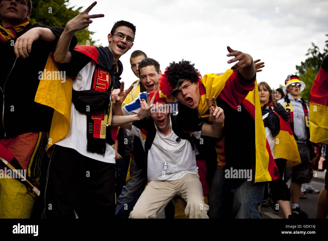 Group of men poses on the German Fan Mile (Fanmeile) at the World Cup in Berlin, Germany, 2010 Stock Photo