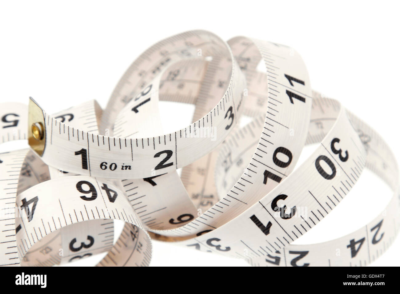 Closeup of coiled measuring tape Stock Photo - Alamy