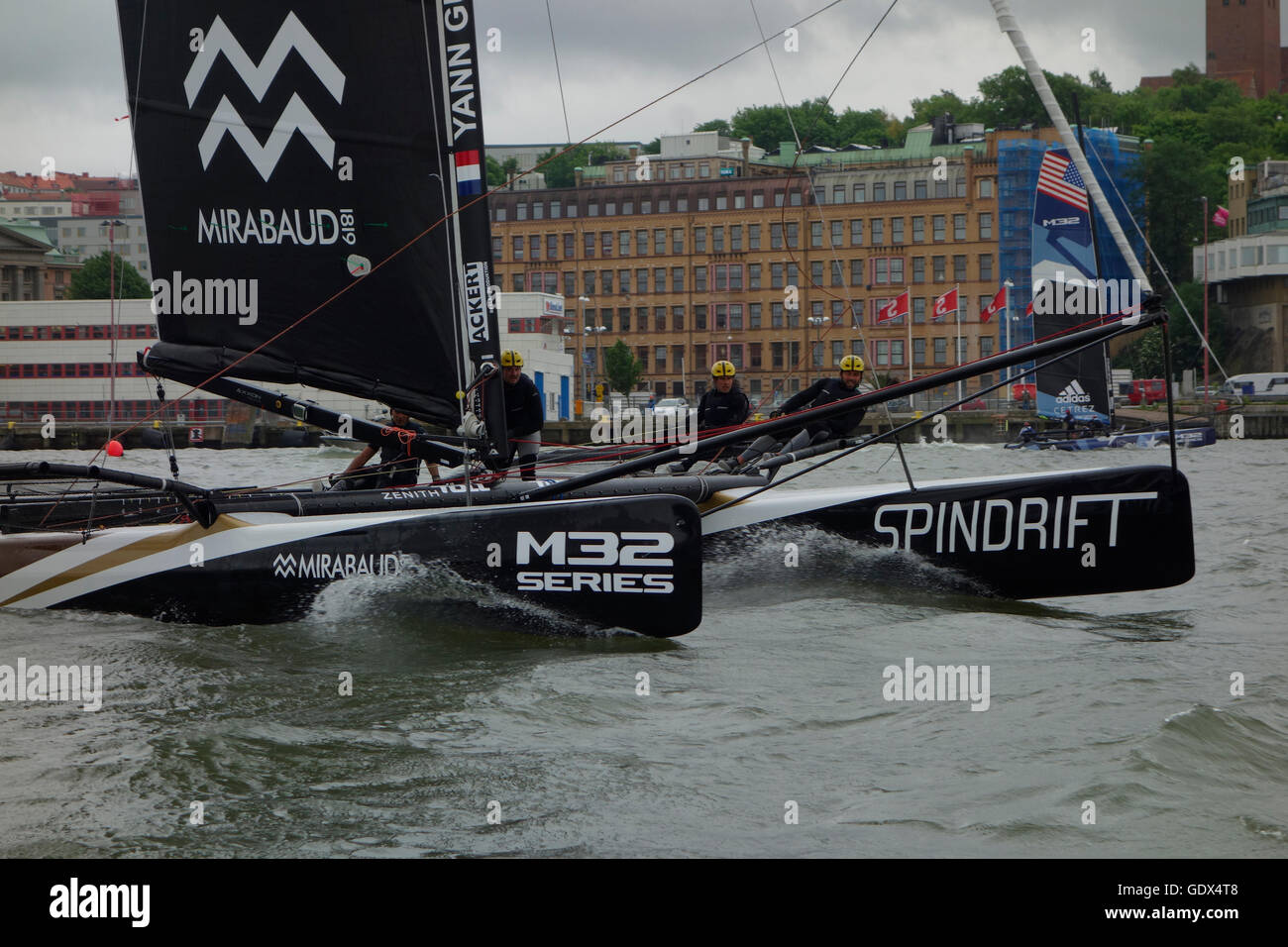 M 32 Series sailing catamaran gaining speed after start during racing