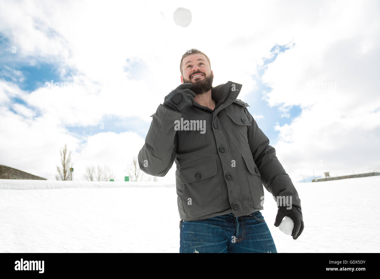 Gorgeous young man looking outdoors in winter season Stock Photo - Alamy