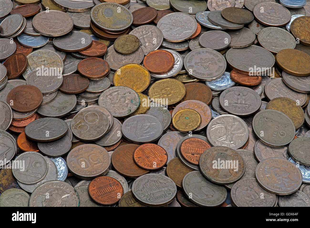 Old coins, different sizes, from different countries Stock Photo