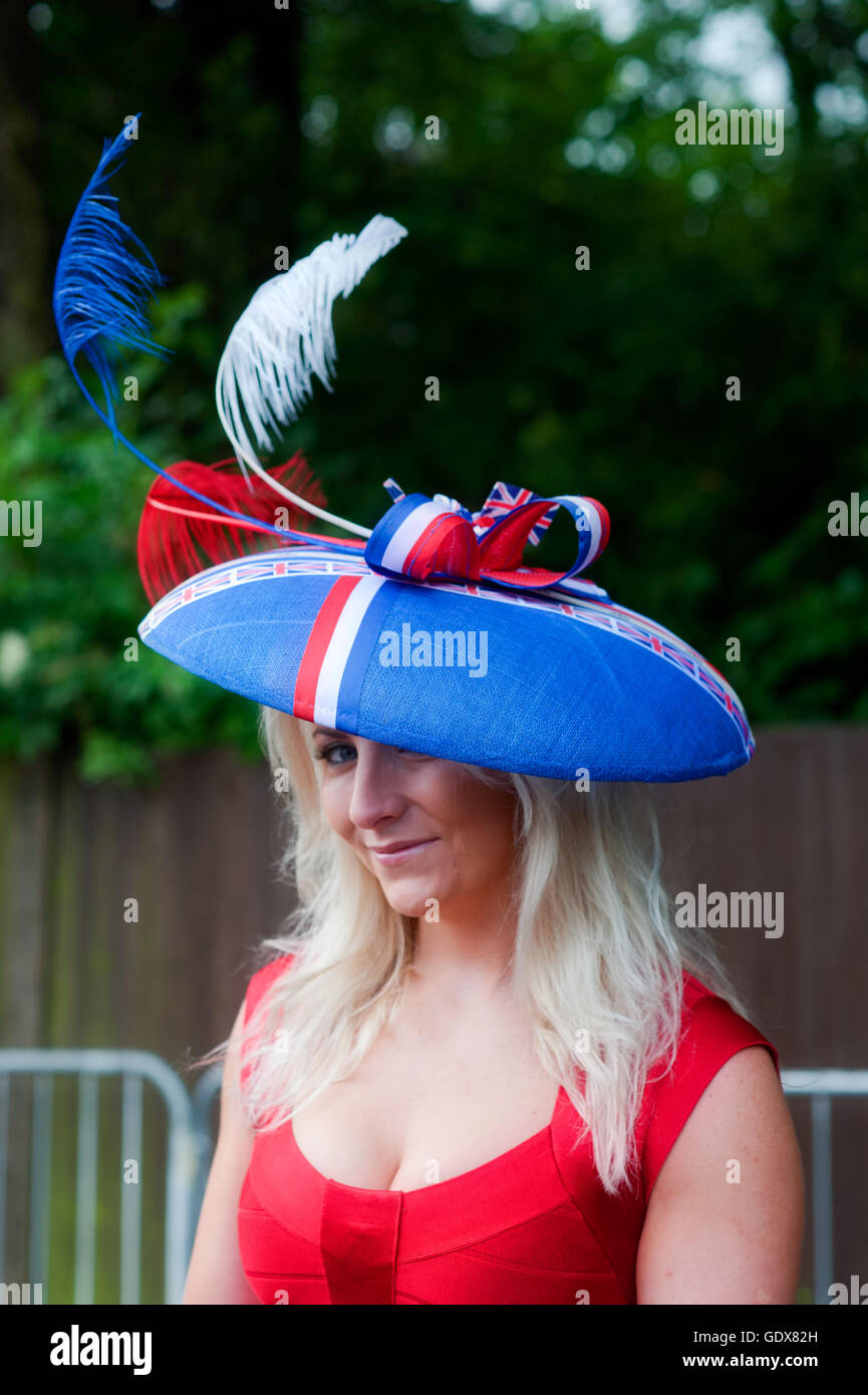 A woman wearing a Fascinator Hat with Union Jack colours, at Royal Ascot  ladies day, Berkshire, England UK Stock Photo - Alamy