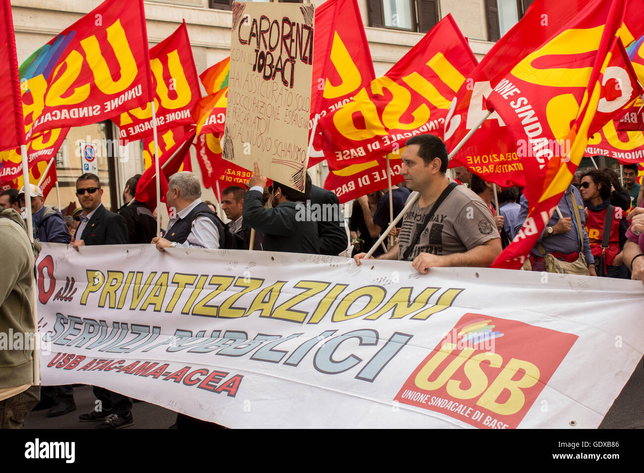 Protesters with banners against the privatization of public services Stock Photo