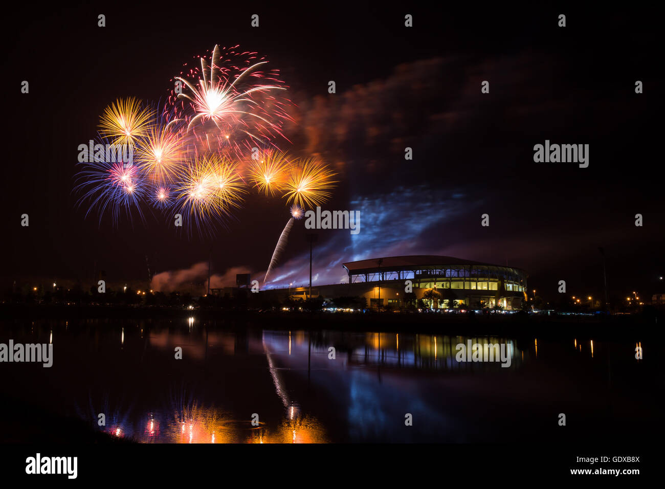 Firework over Stadium in nighttime Stock Photo