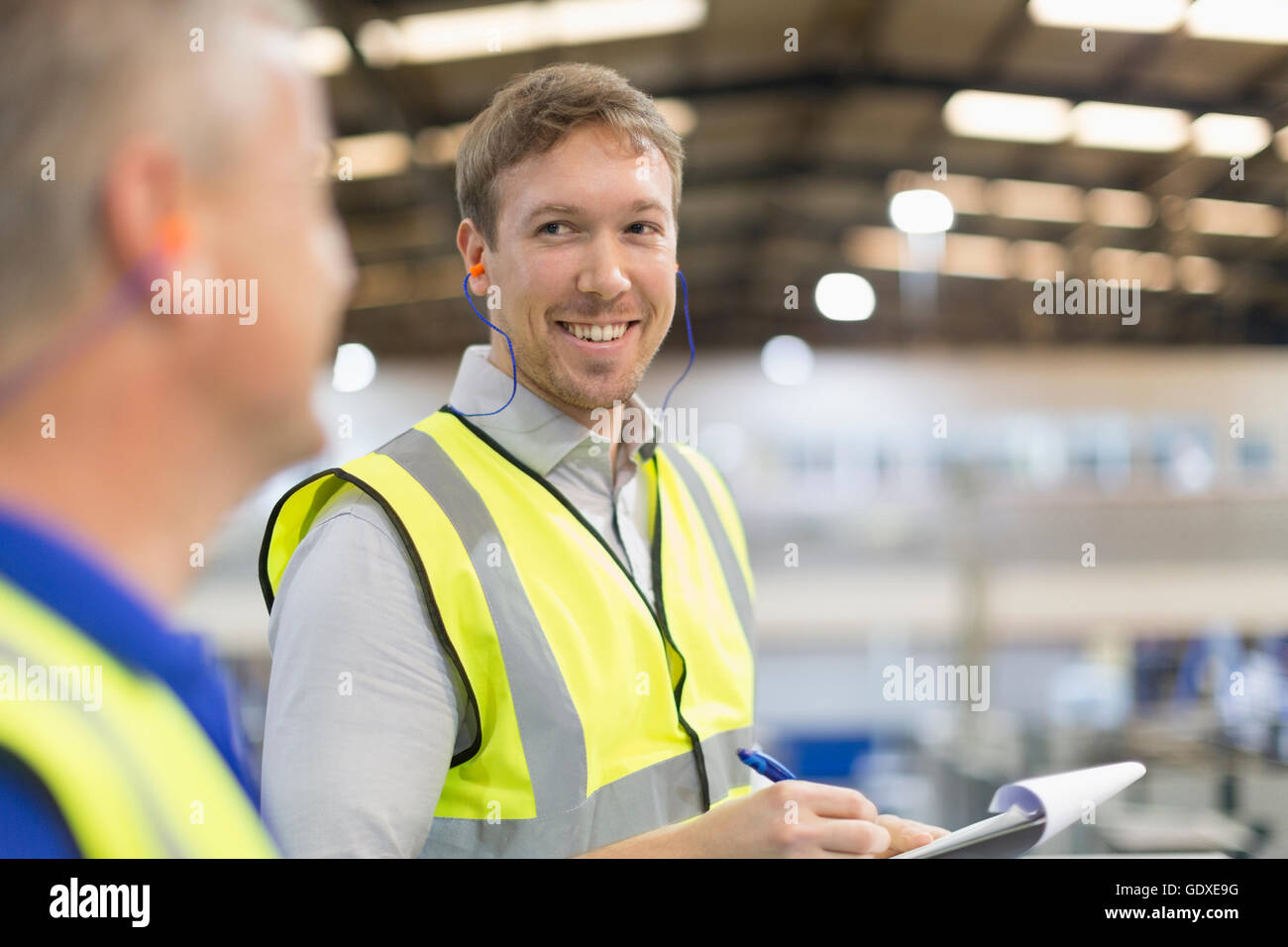 Supervisor talking in steel factory hi-res stock photography and images ...