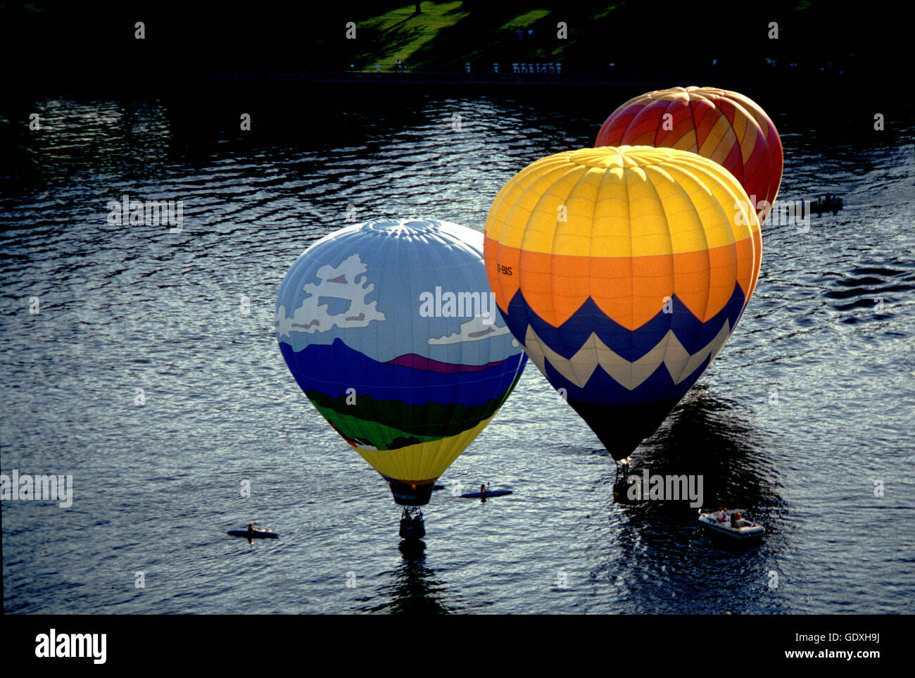 Hot air balloons floating over the Richelieu River in StJeansur