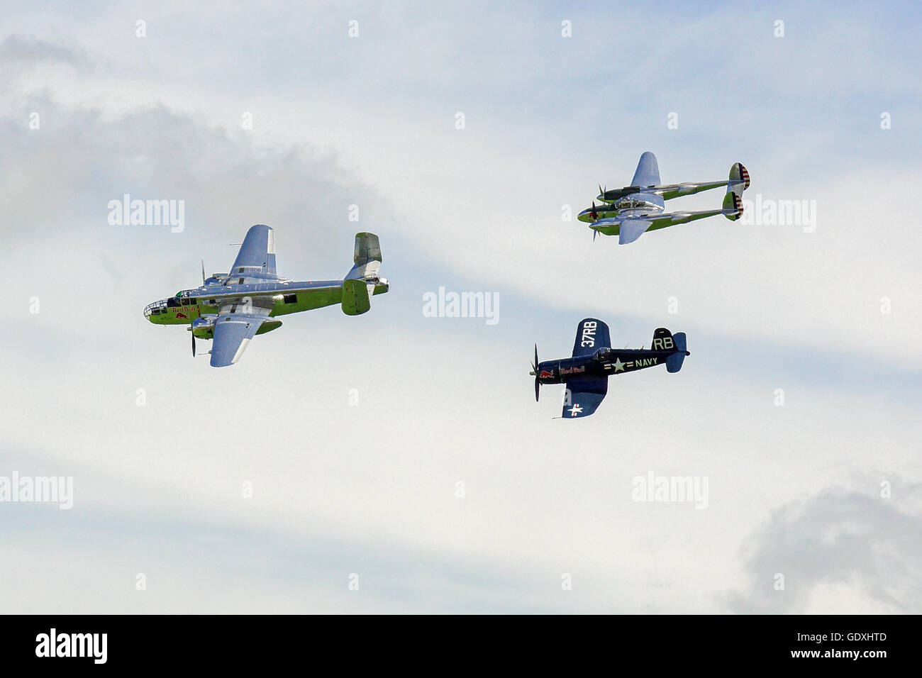 B25 Mitchell, P38 Lightning, FU-4 Corsair in formation at Flying Legends RAF Duxford Stock Photo