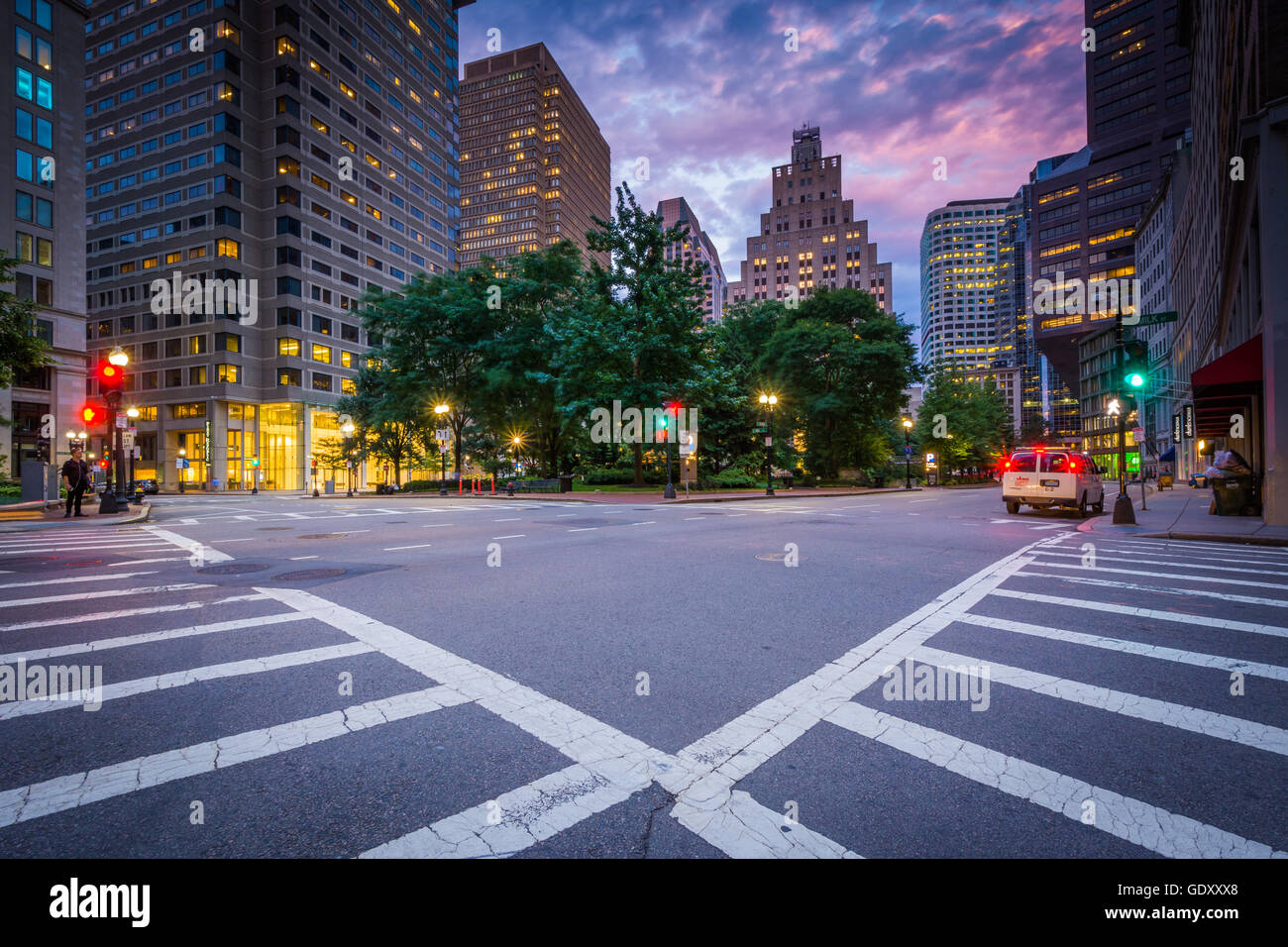 An intersection and crosswalks in the Financial District at sunset, in Boston, Massachusetts. Stock Photo