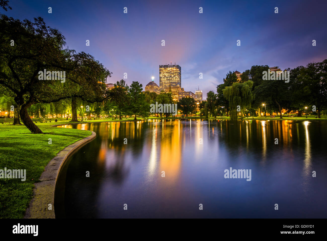 The lake at the Public Garden and buildings at Copley at night, in Boston, Massachusetts. Stock Photo