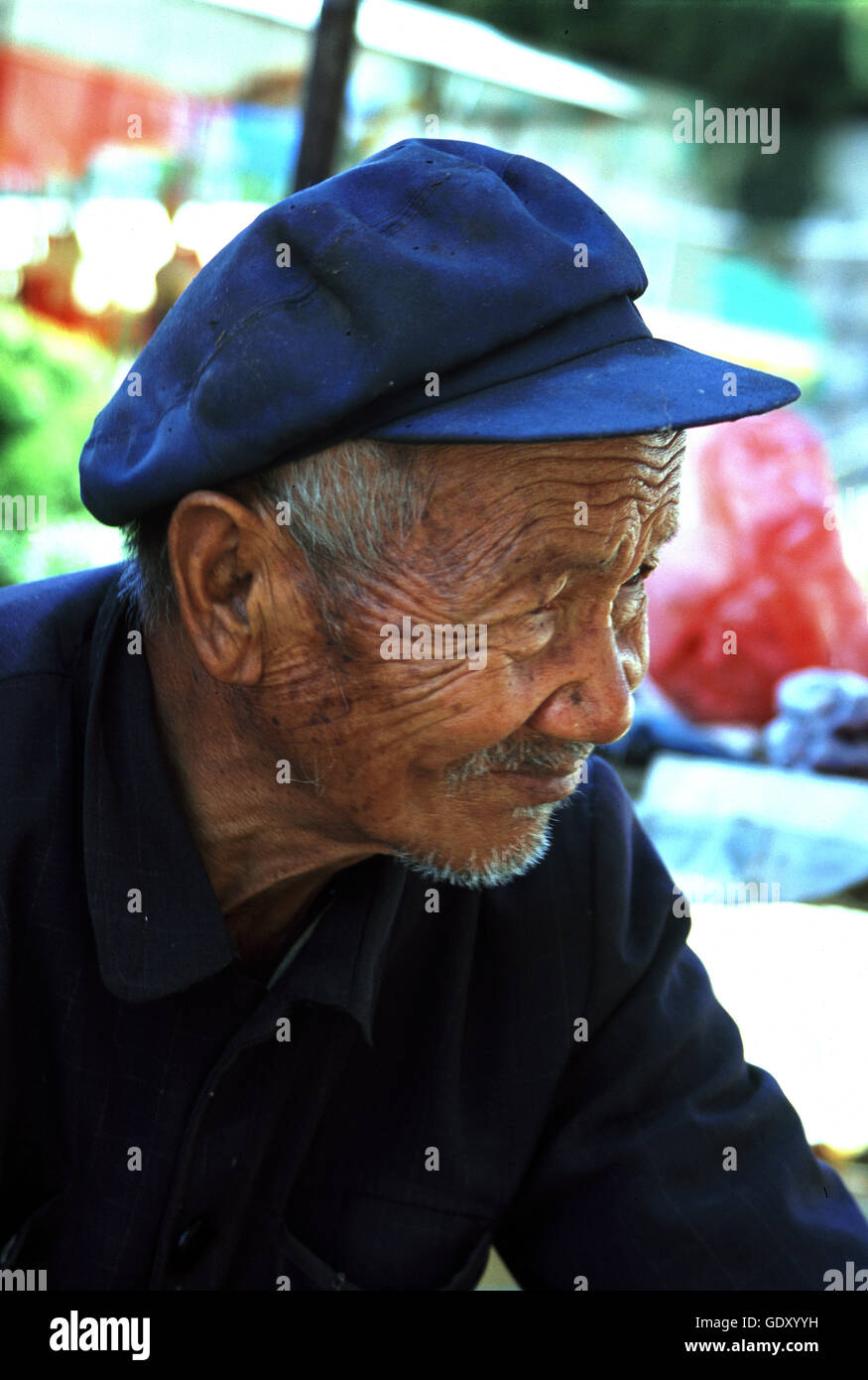 An elderly man at the Stone Forest in Lunan Yi Nationality Autonomous County. Yunnan Province in China. Stock Photo