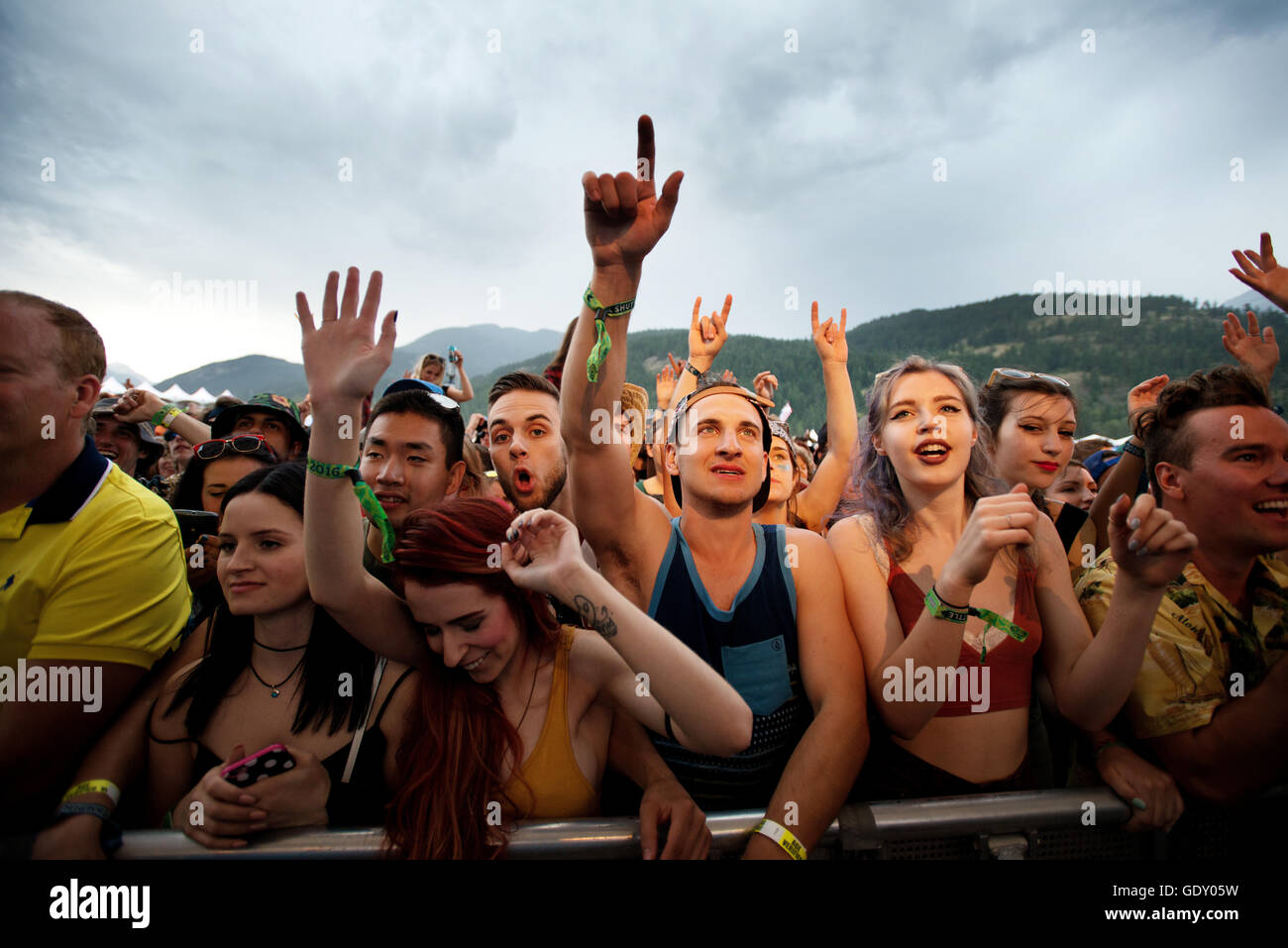 Concert goers at the Pemberton Music Festival.  Rock concert crowd. Outdoor Concert.  Rock fans crowd. Stock Photo