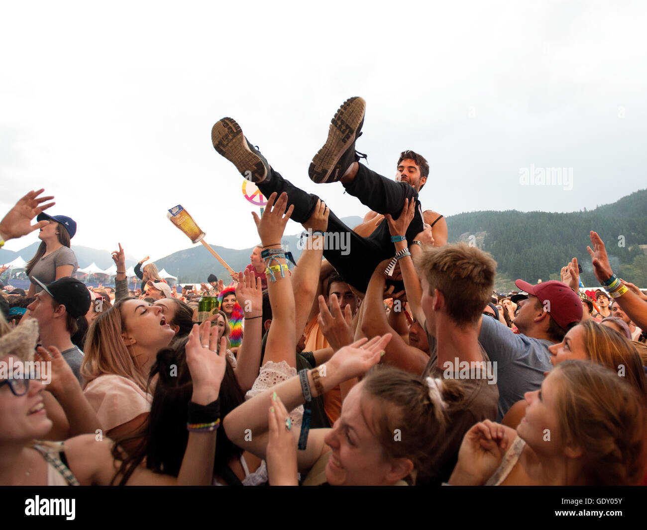 Crowd Surfing.  Concert goers at the Pemberton Music Festival.  Pemberton BC, Canada Stock Photo