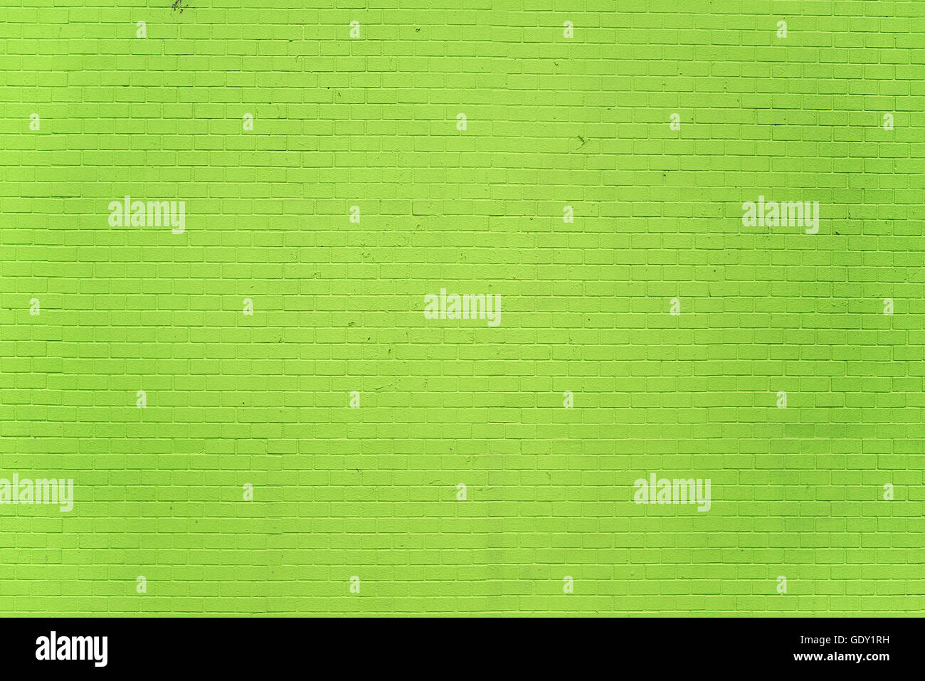 Weathered green brick wall texture as background Stock Photo