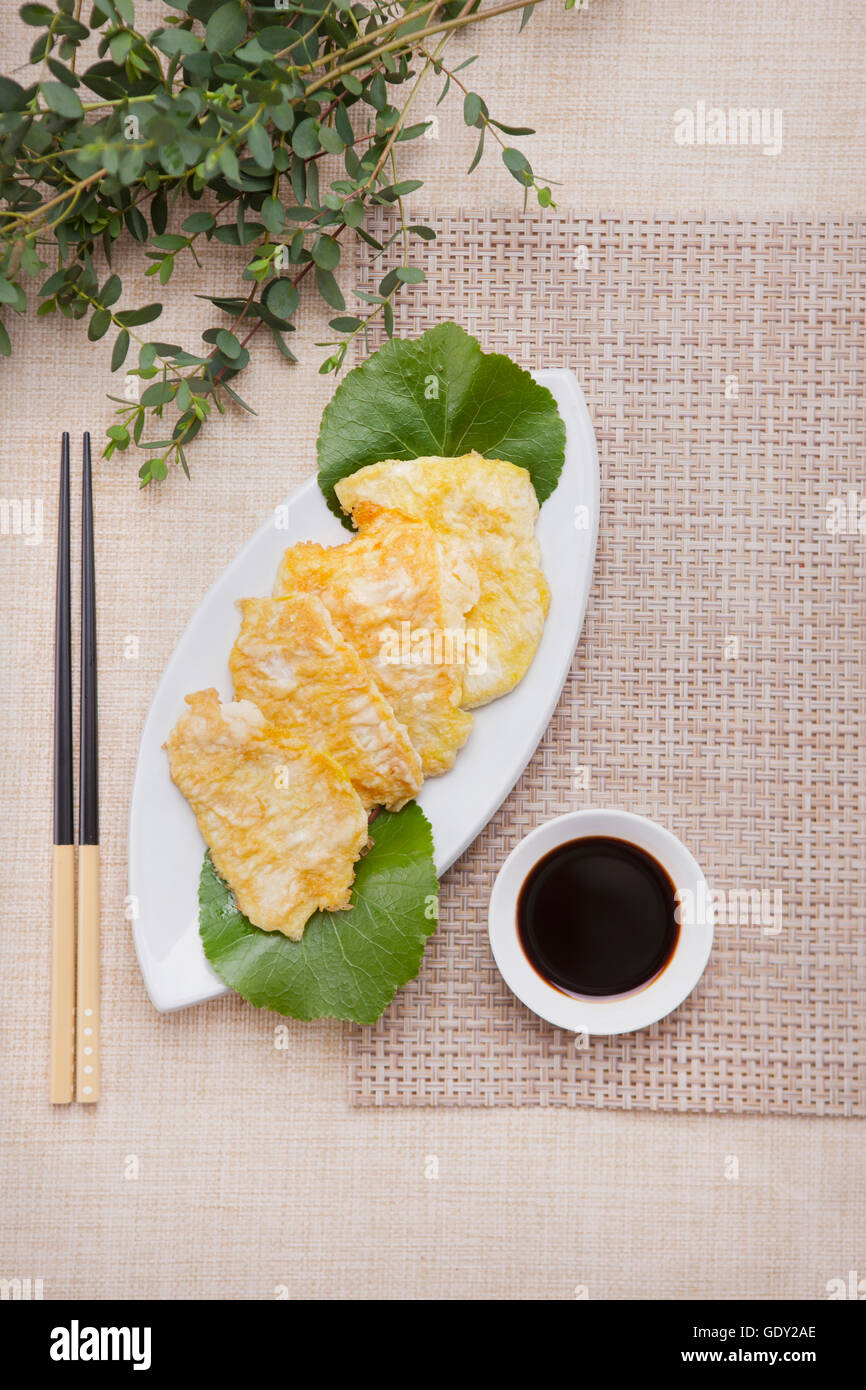 Traditional Korean food, pancakes and sauce with chopsticks Stock Photo Alamy