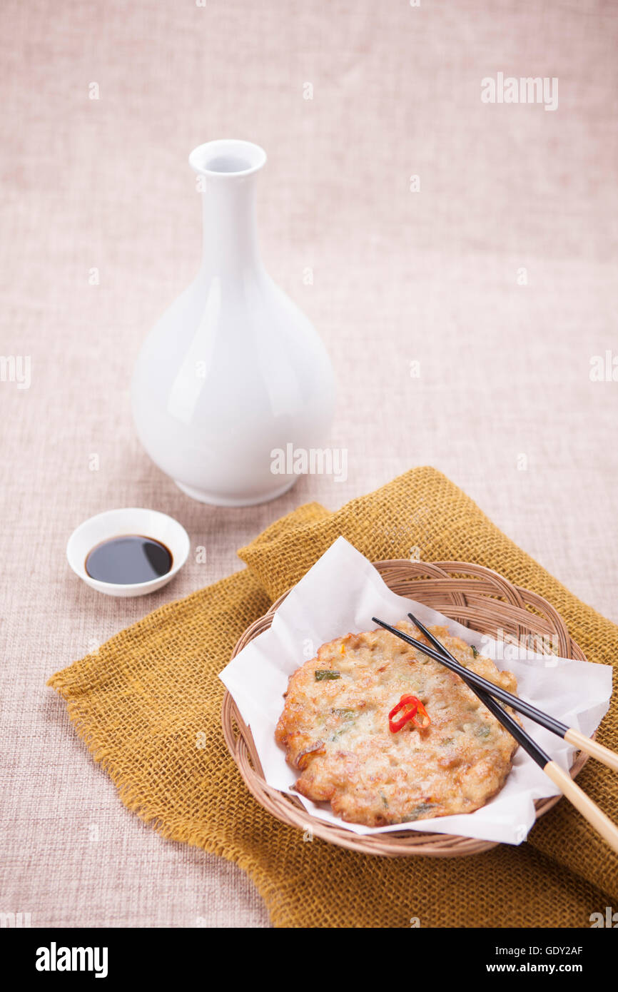 Traditional Korean wine bottle with pancake and sauce Stock Photo Alamy
