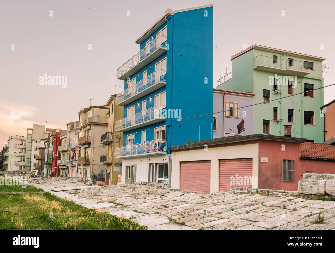 Typical houses in Sottomarina (Italy) with the embankment that protects them from sea storms. Stock Photo