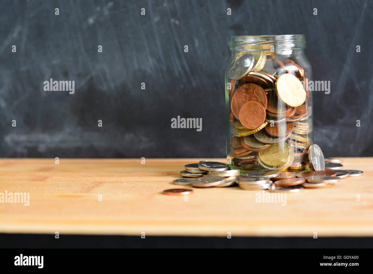 Personal savings concept illustrated with money in a jar Stock Photo