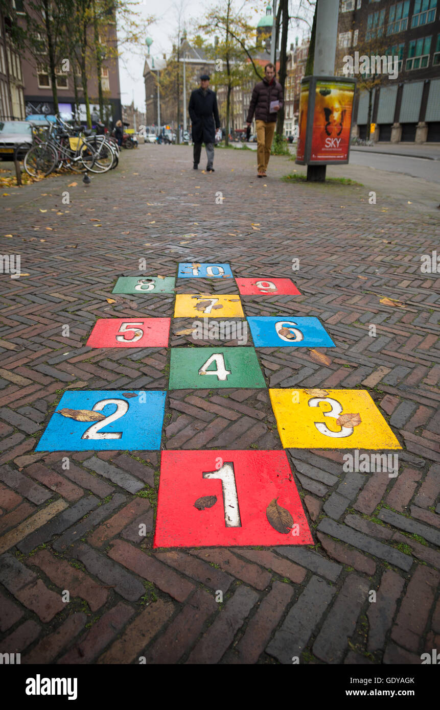 AMSTERDAM, NETHERLANDS - NOVEMBER 15, 2015: Colorful hopscotch game in the streets of amsterdam Stock Photo