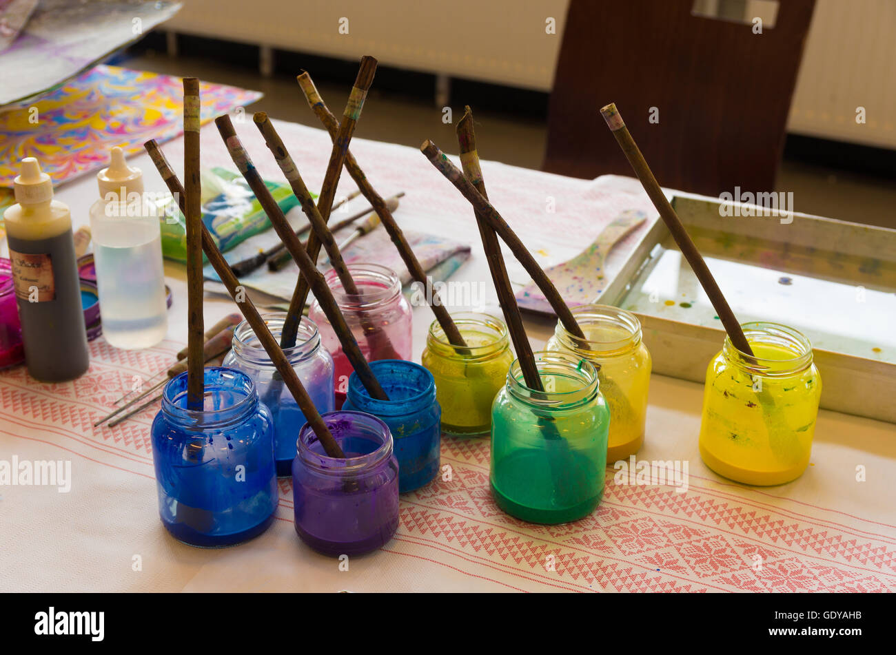 glass paint pots with brushes Stock Photo Alamy