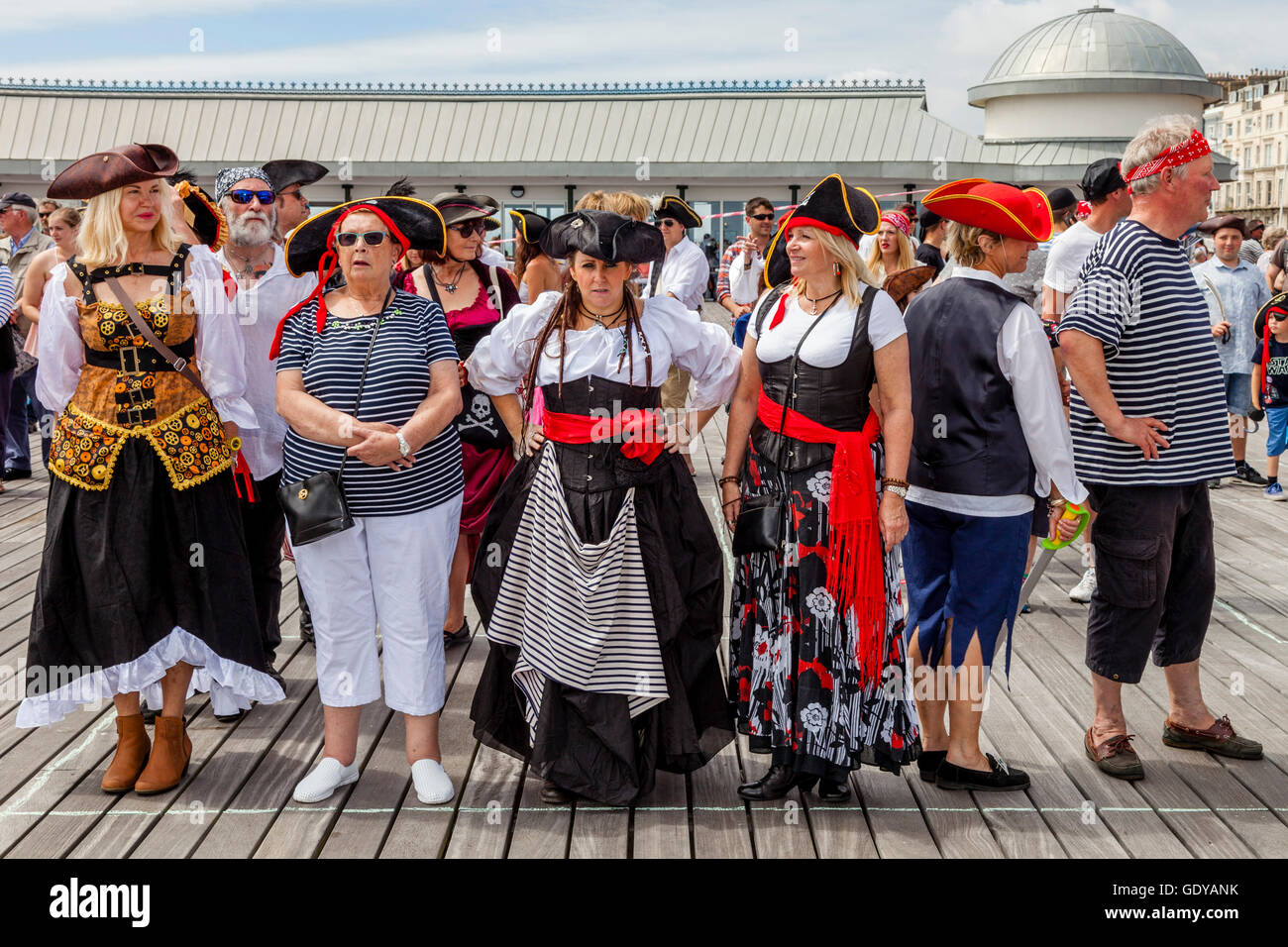 People Dressed In Pirate Costumes Pose For A Group Photo On Hastings