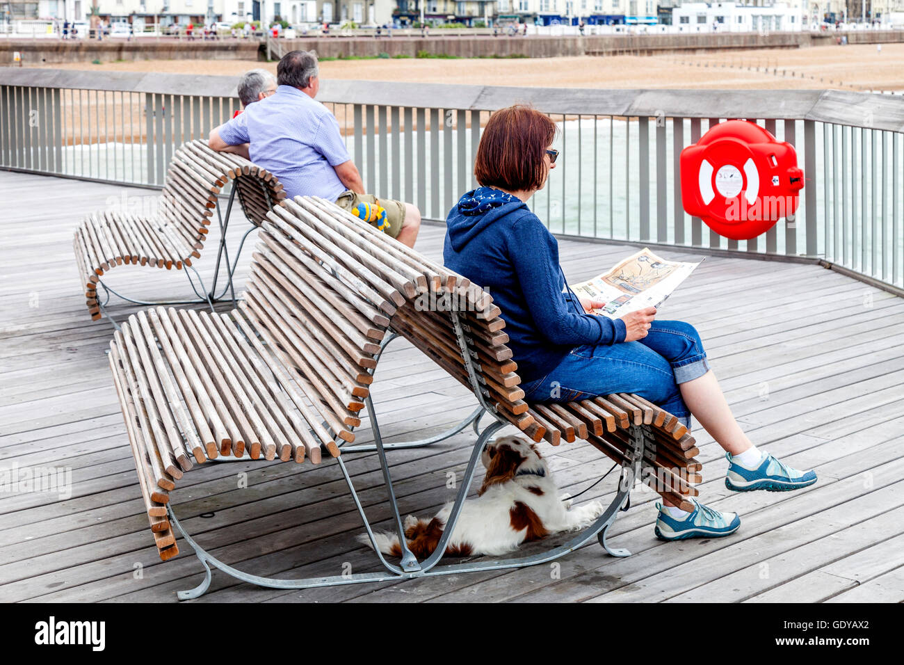 Mature woman sitting on pier hi-res stock photography and images - Alamy