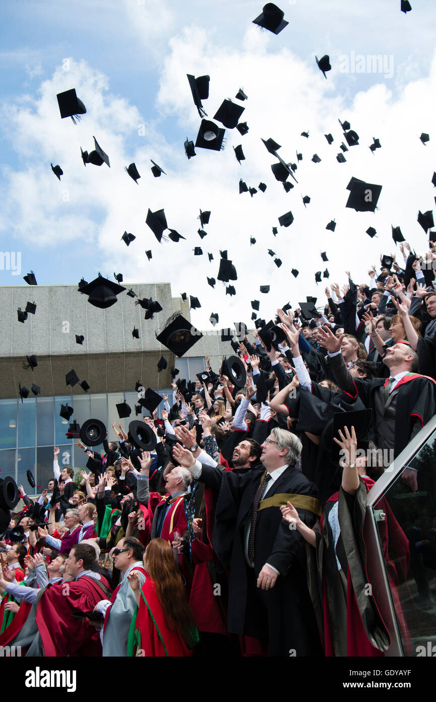 Students graduation uk throwing caps hires stock photography and
