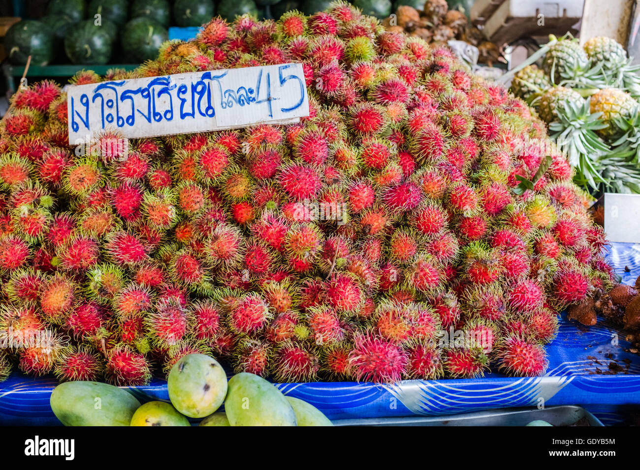 Rambutans for sale in local market,Chiang Mai,Thailand Stock Photo