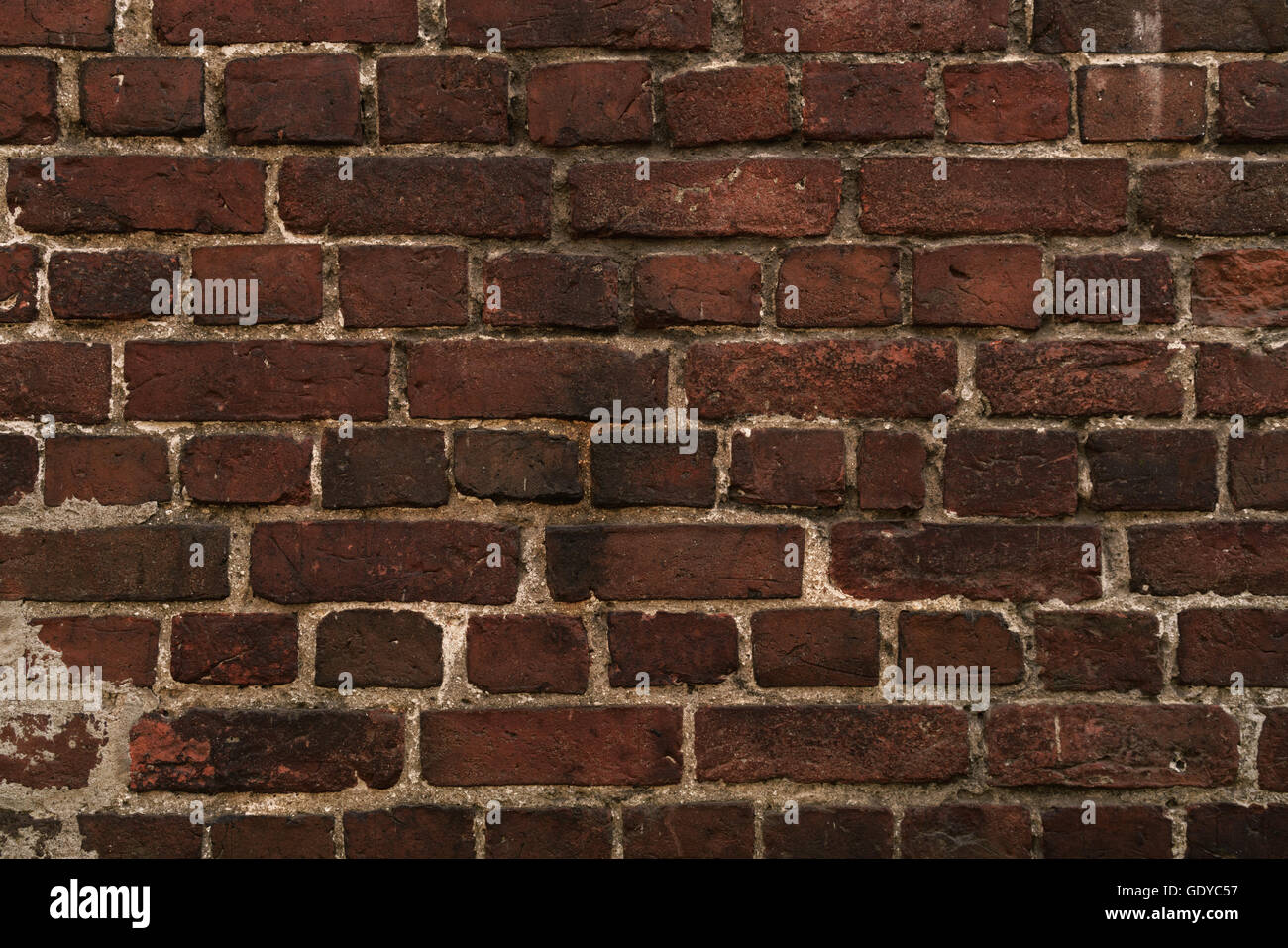 old dark brick wall background Stock Photo - Alamy