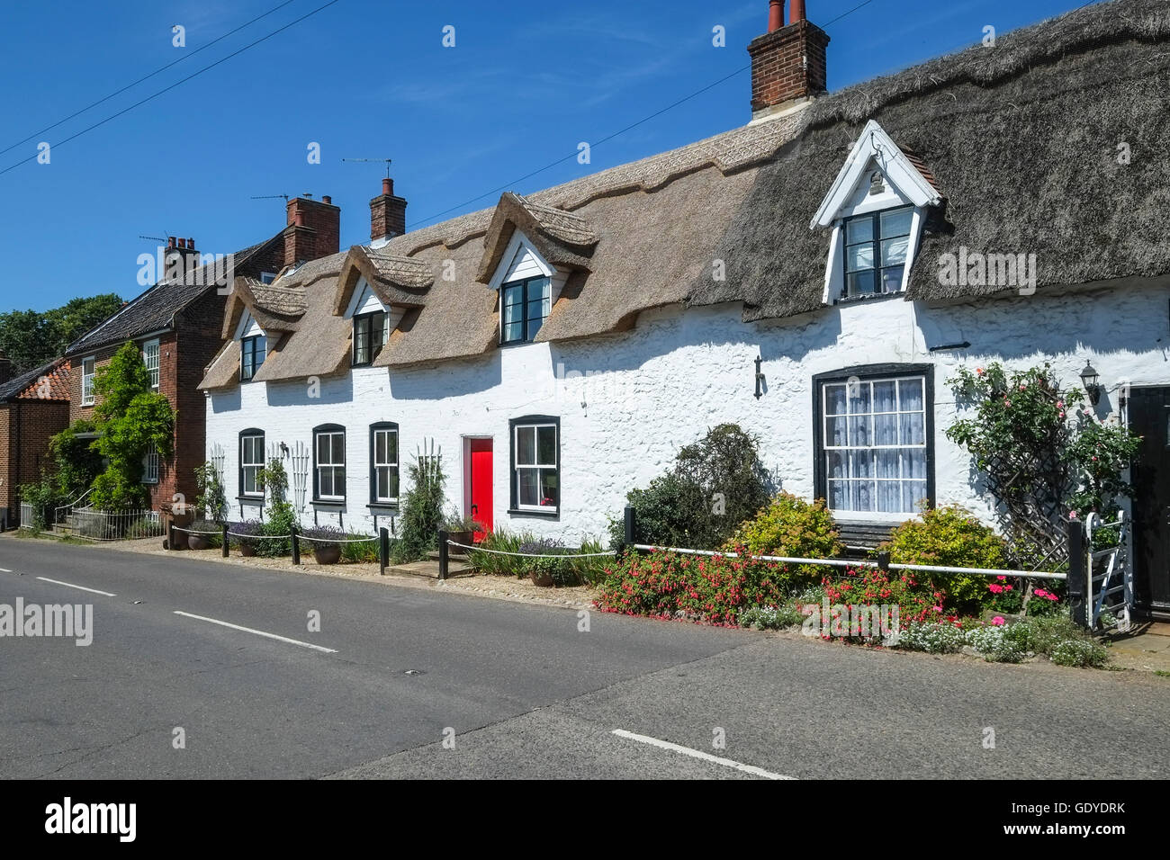 Thatched cottages in the village of Ludham in Norfolk Stock Photo