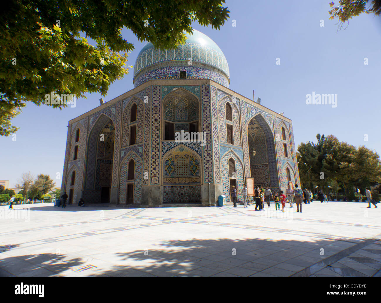 It is the shrine of Khawaja Rpiea one of the owners of Imam Ali ibn Musa Alreza, its  in the form of a ribbed dome surrounded by green gardens and very beautiful trees. Stock Photo