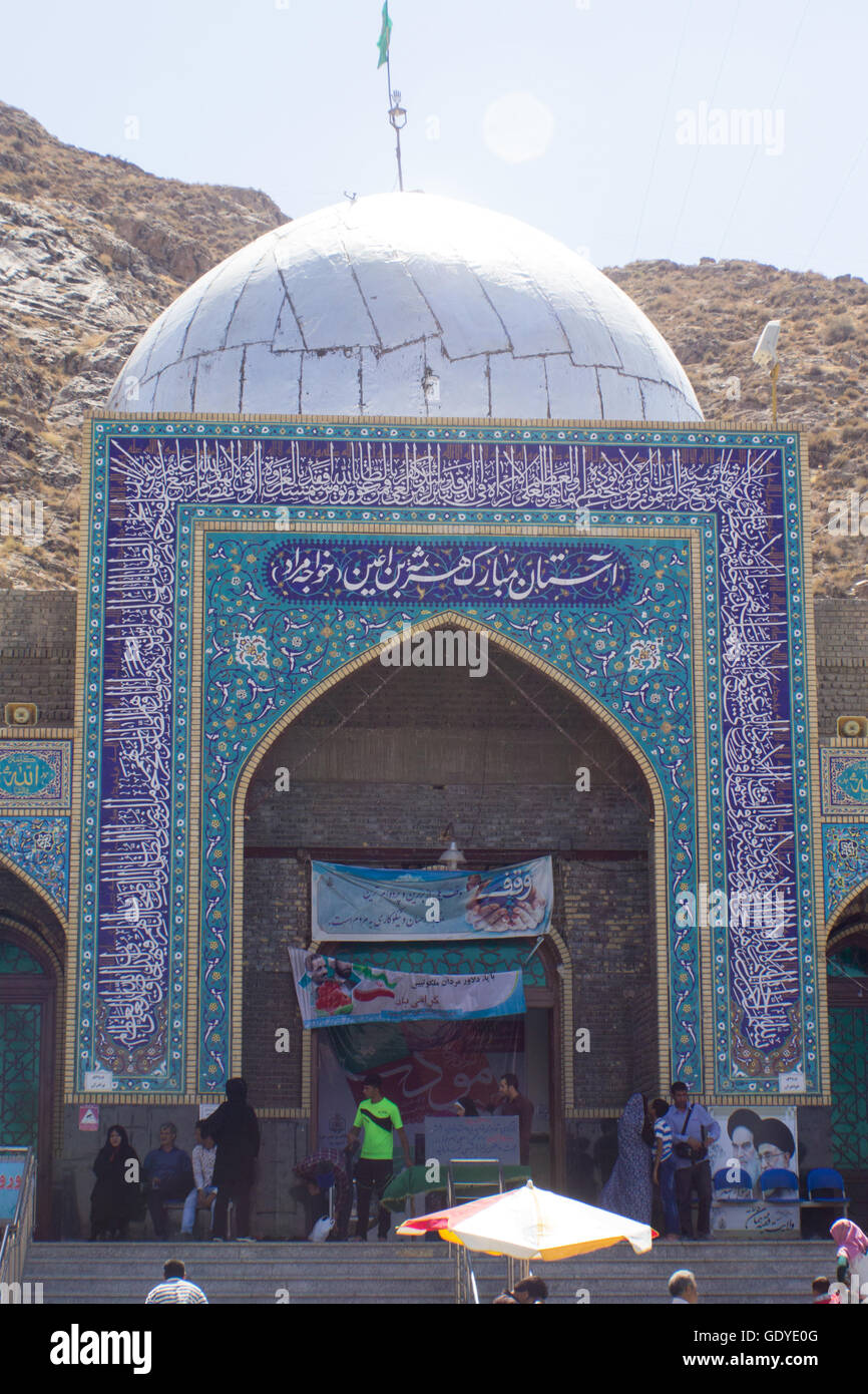 It is the shrine of Khawaja Murad one of the owners of Imam Ali ibn Musa Alreza, it in the form of a ribbed dome surrounded by green gardens and very beautiful trees. Stock Photo