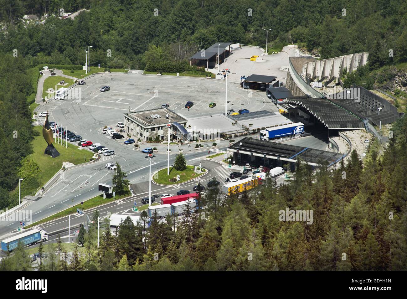 The entrance on the French side of the Mont Blanc tunnel in Chamonix lies in the afternoon sun. The Mont Blanc Tunnel connects the Mont Blanc massif, Chamonix in France to Courmayeur in Italy's Aosta Valley. | usage worldwide Stock Photo