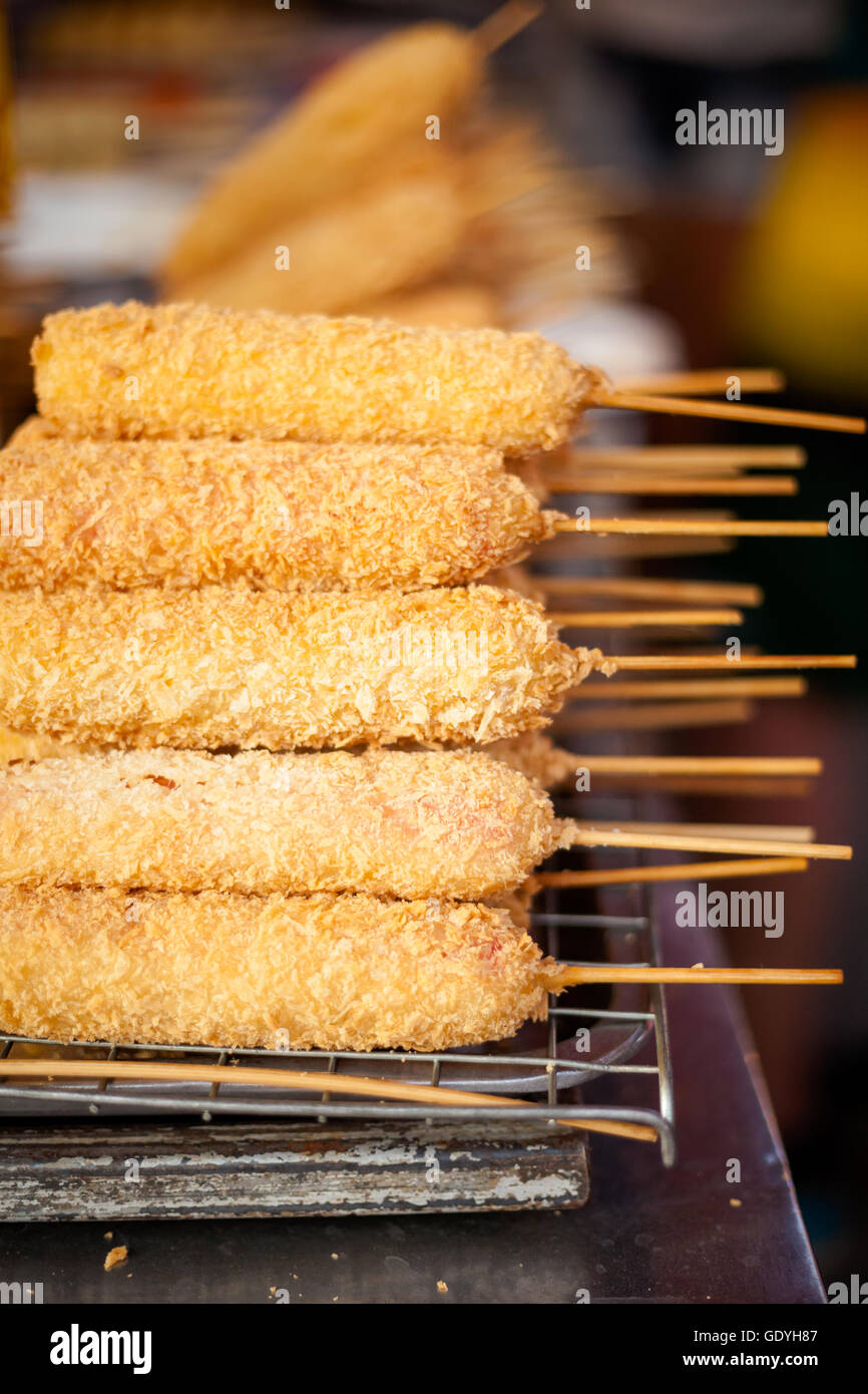 Deep fried sausage skewer battered in panko flakes. Traditional thai