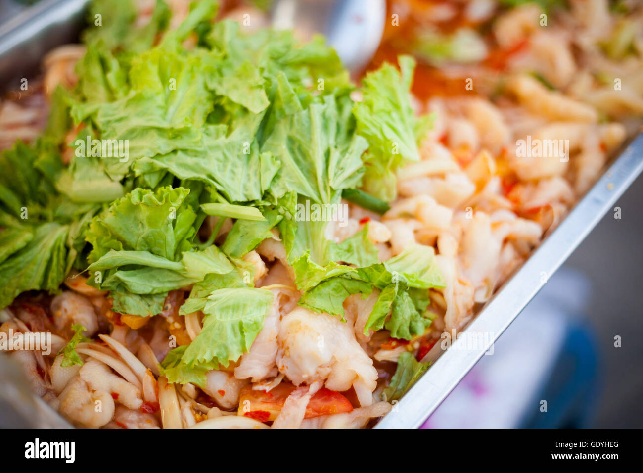 Fresh made asian stir fry. Traditional thai cuisine in big tray Stock