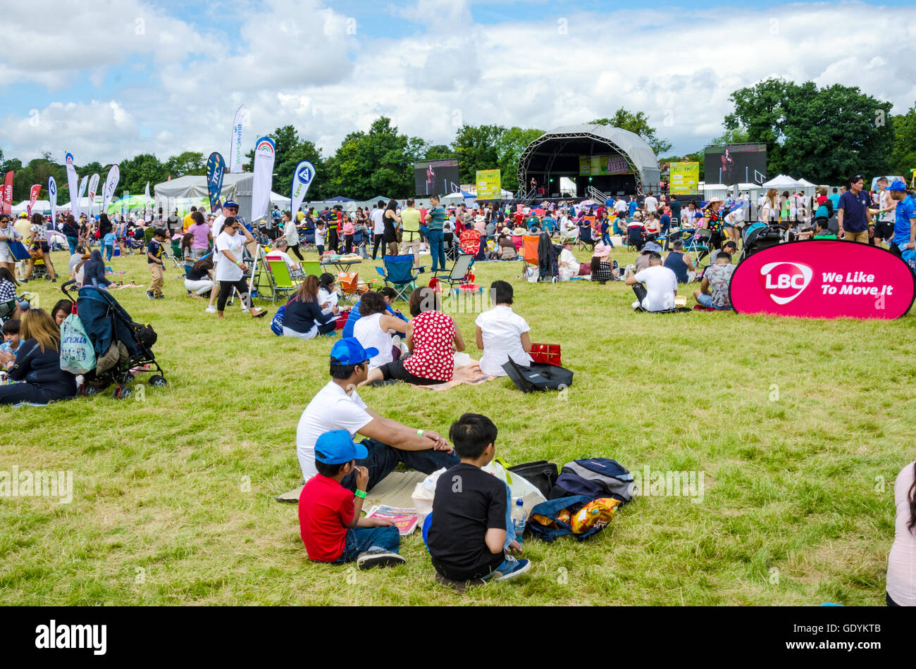 Looking across a crowd of people at the stage at The Barrio Fiesta 2016 in London. Stock Photo