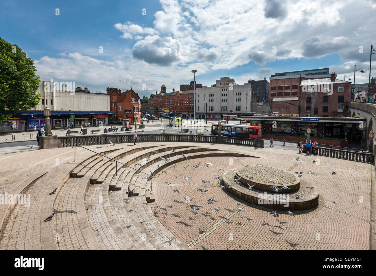 Pigeons flying over Mersey square in the town of Stockport, Greater Manchester, England. Stock Photo