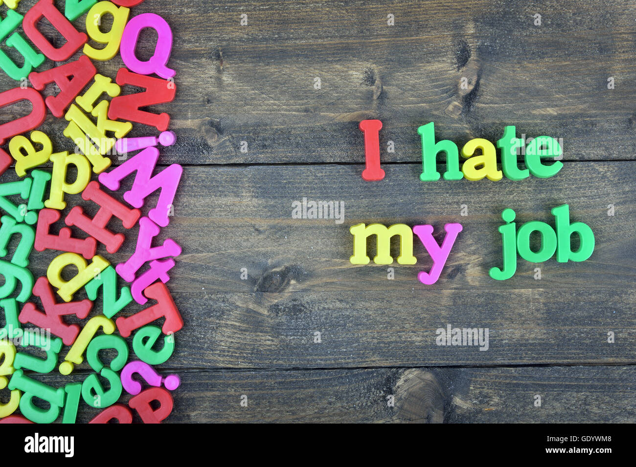 I hate my job word on wooden table Stock Photo