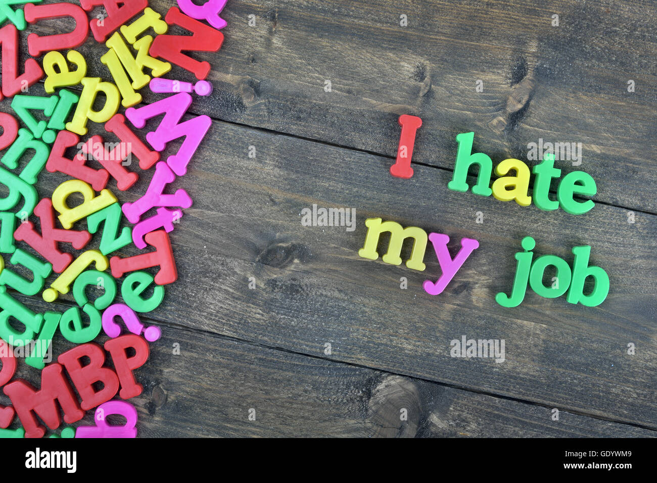 I hate my job word on wooden table Stock Photo