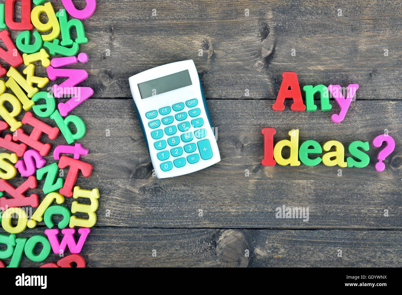 Any ideas ? question on wooden table Stock Photo - Alamy