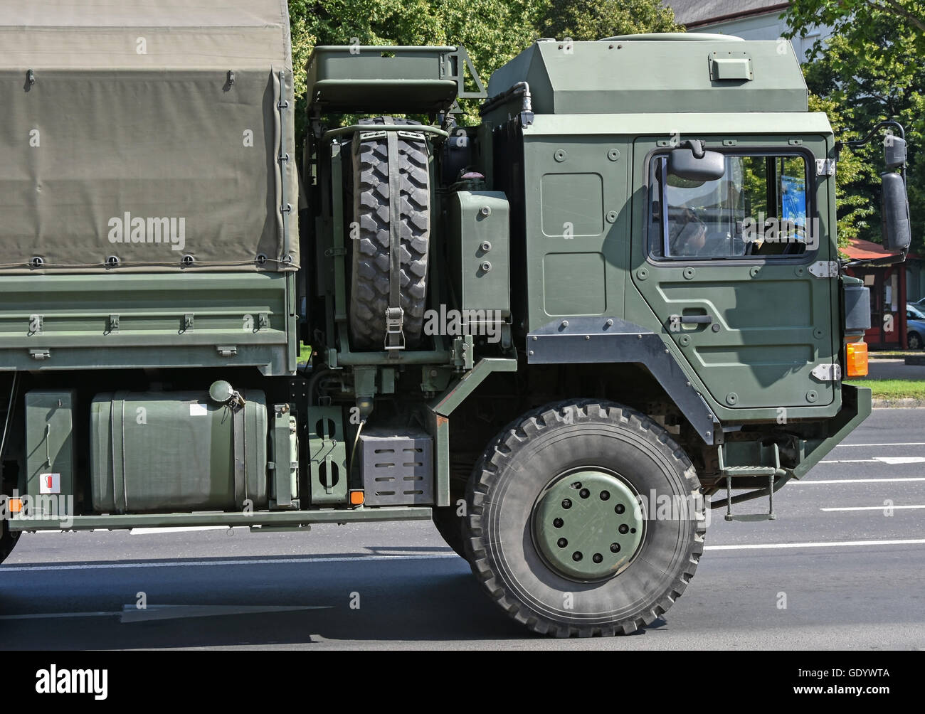 Military truck vehicle on the road Stock Photo