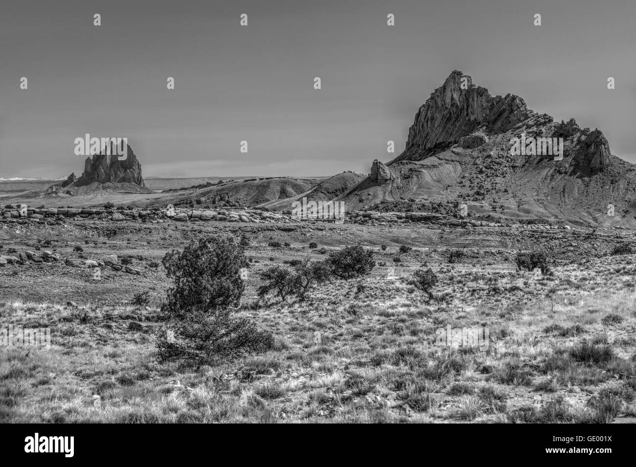 Mitten Rock, foreground, and Shiprock, background, in northwestern New Mexico Stock Photo
