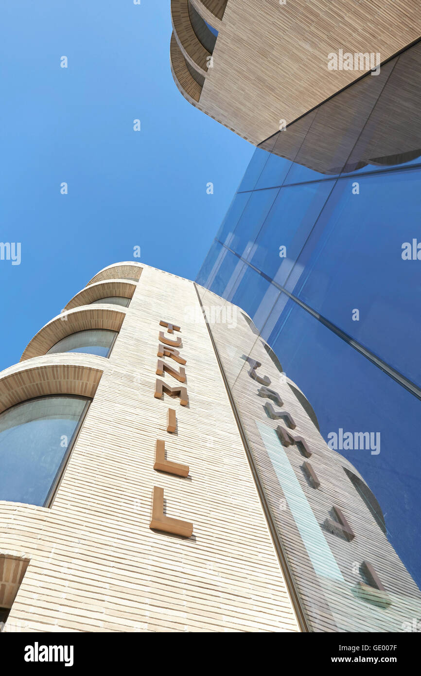 Brick facade with reflection in glazing. Turnmill Building, London, United Kingdom. Architect: Piercy & Company, 2015. Stock Photo