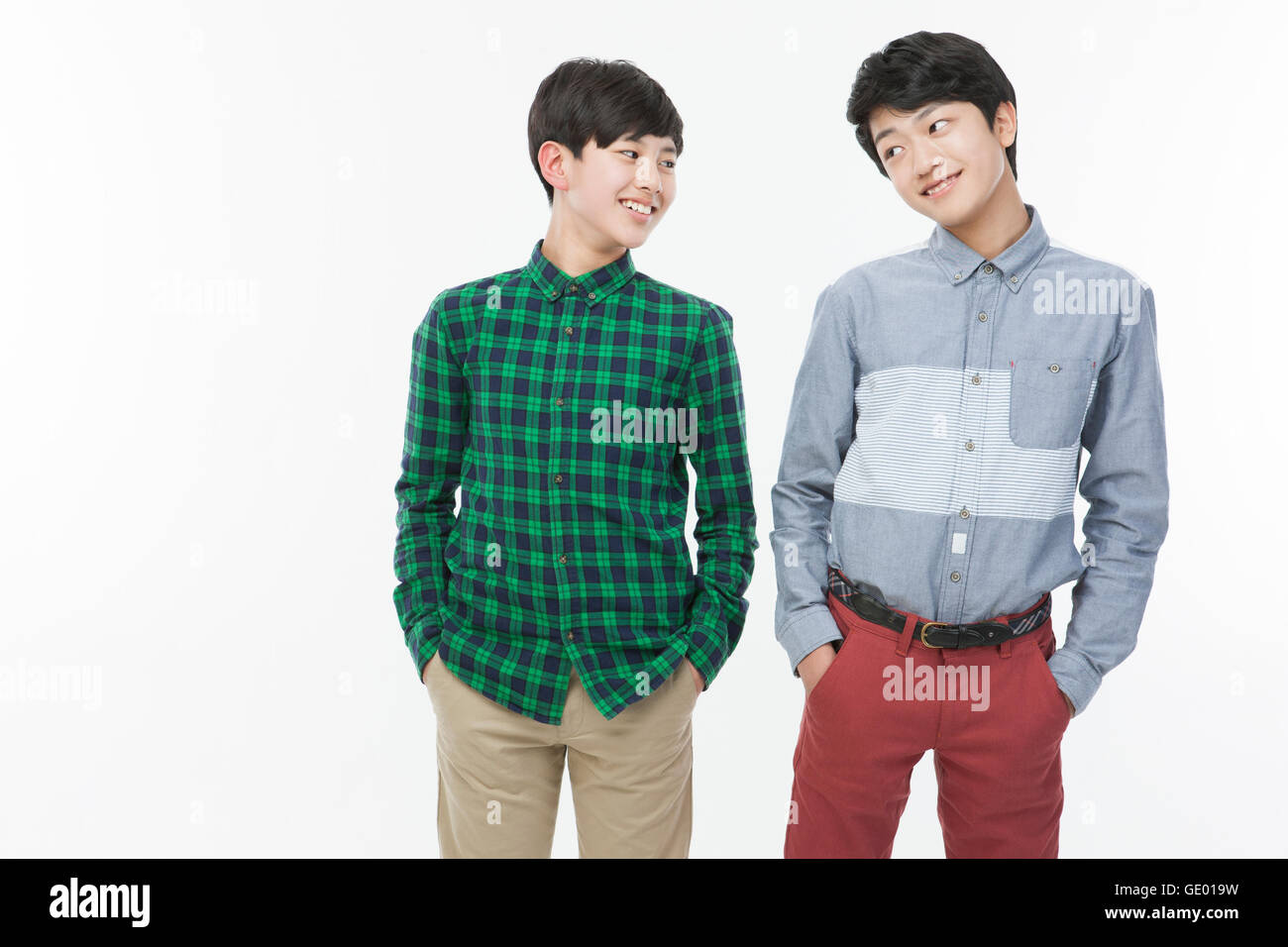 Two smiling school boys in casual clothes Stock Photo
