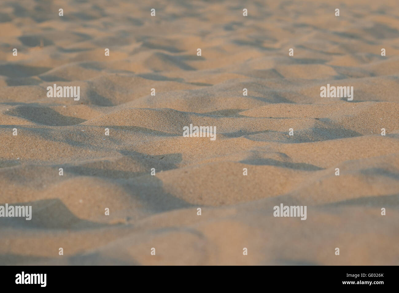 Background of yellow sand pattern created by the wind Stock Photo