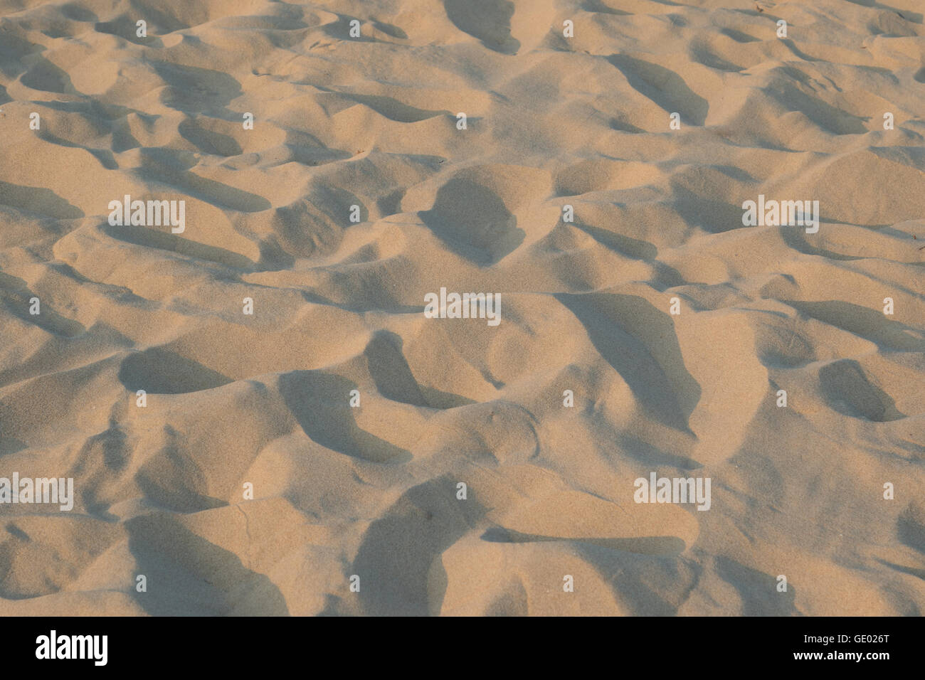 Background of yellow sand pattern created by the wind Stock Photo