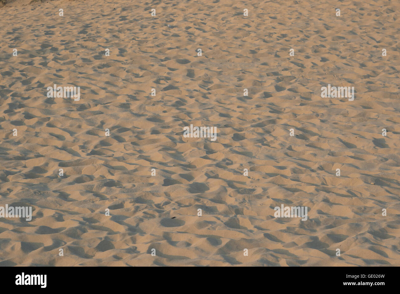 Background of yellow sand pattern created by the wind Stock Photo
